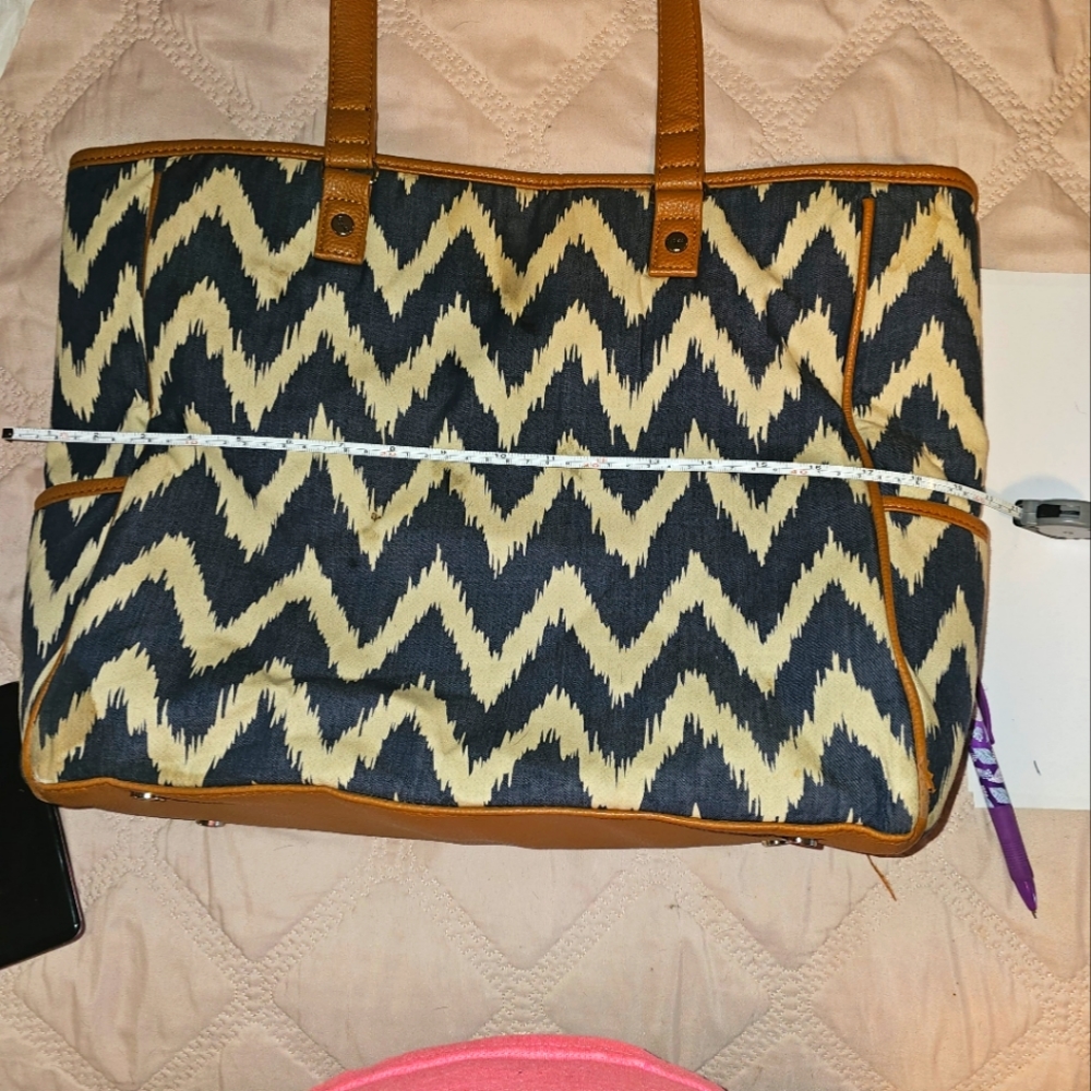 Thirty- one bag can be a purse or a carrying bag for everything.